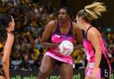 Adelaide's Romelda Aiken-George (centre) looks for a teammate against the Lightning. (Jono Searle/AAP PHOTOS)