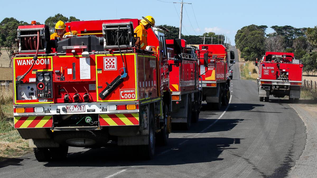 Country Fire Authority trucks on a Victorian regional road. Picture by Morgan Hancock