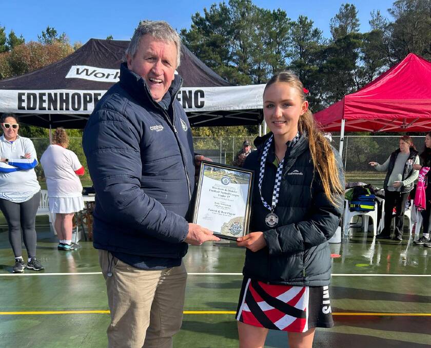 Edenhope Apsley netballer Holly Whitehead receives her Blue Ribbon Foundation Spirit of Netball award from foundation member Les Power. Picture supplied