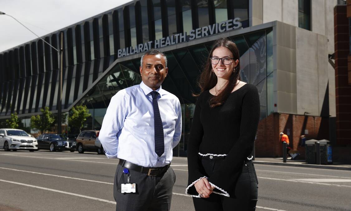 Dr Wasek Faisal and researcher Rosa Concalves who was part of a program placing aspiring science graduates in to clinical trial units across Victoria in 2021. Picture: Luke Hemer
